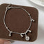 Conjunto Pulseira mais Tornozeleira Com Bolas de sino de Natal - Fabi Joias